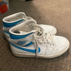 Blue and white Jordans Mid